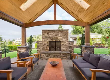 OutdoorFirePricing_and_homepage_services_resizer - Motown Fire LLC - Motown Fire LLC beautiful covered patio with luxury stone fireplace