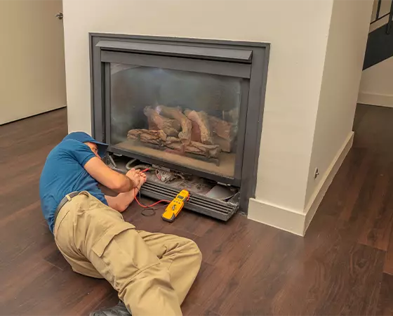 sections_resizer11 - Motown Fire LLC - Motown Fire LLC gas fireplace under repair