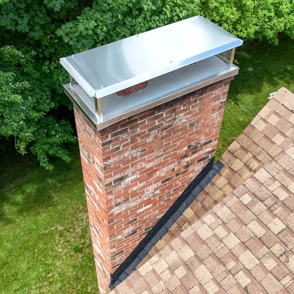 Prevent Chimney Leaks with a custom chimney cap installation in Huntington Woods and Royal Oak MI