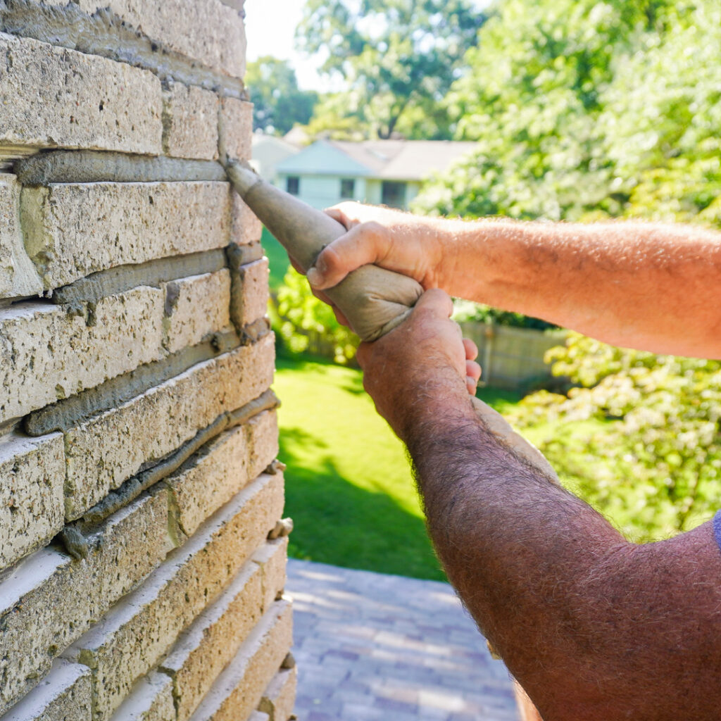 Prevent Chimney Leaks with professional chimney tuckpointing in Auburn Hills and Rochester Hills MI