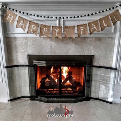 light colored marble fireplace