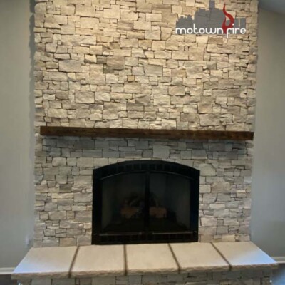beautifully finished stone fireplace